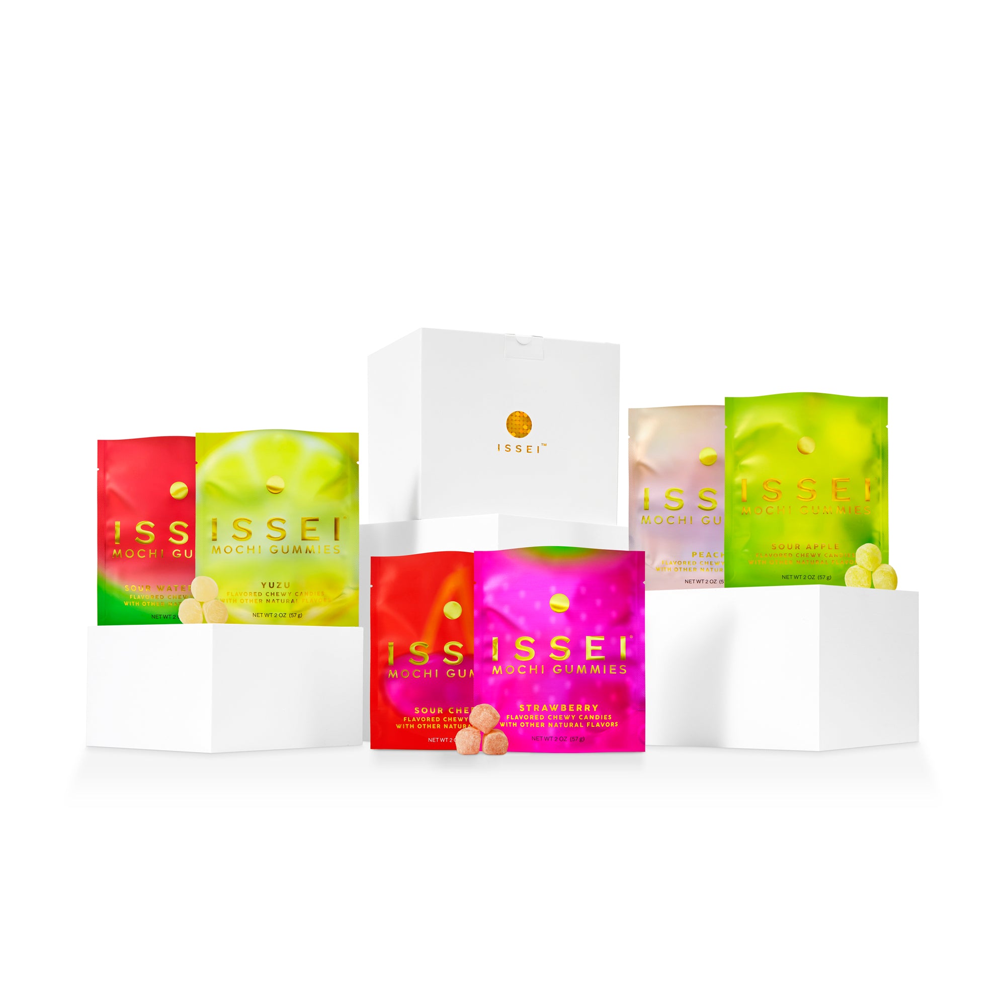 Assorted colorful packets of Issei gummies on a white background