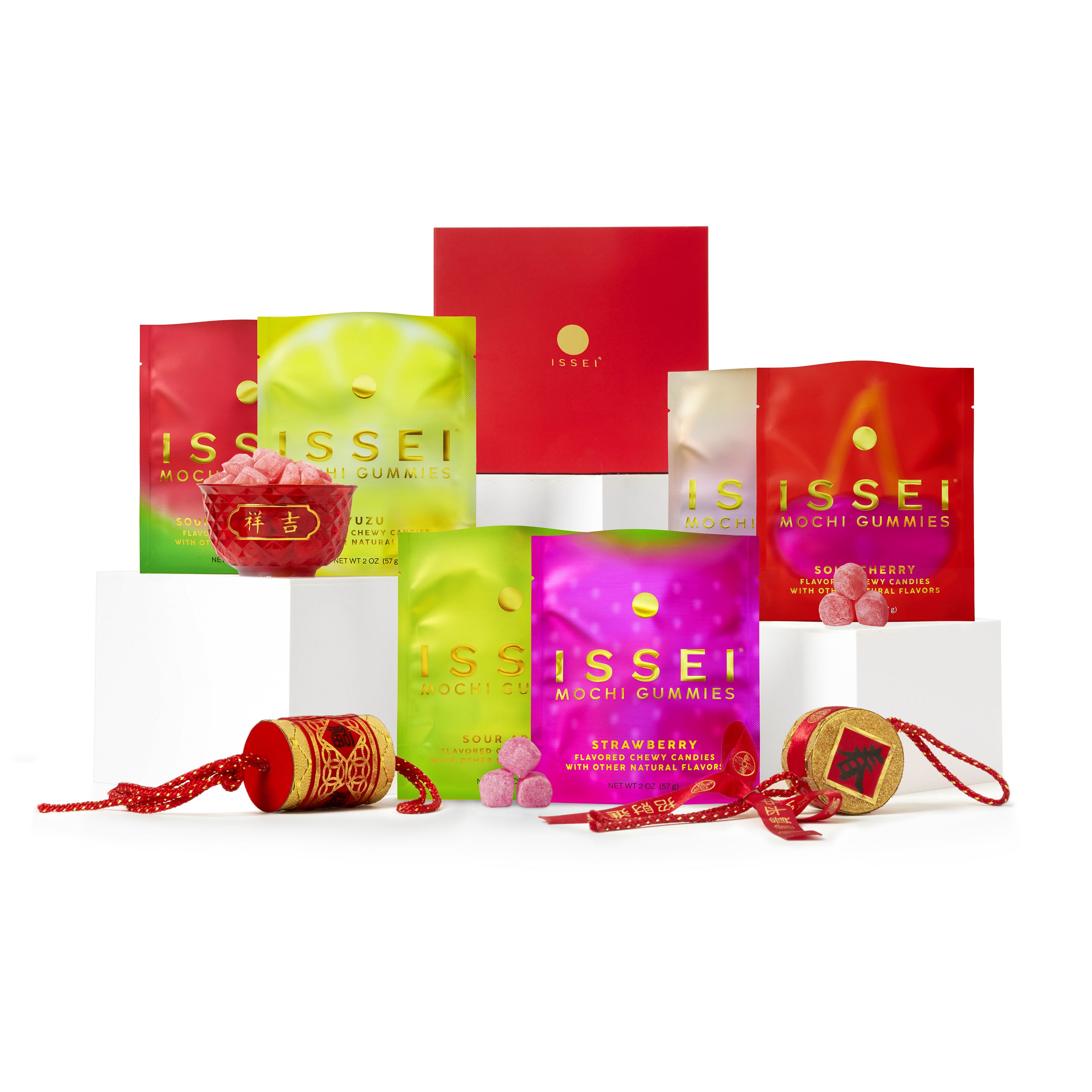 Issei Mochi Gummies red lunar new year box with colorful packaging and festive decorations on white background