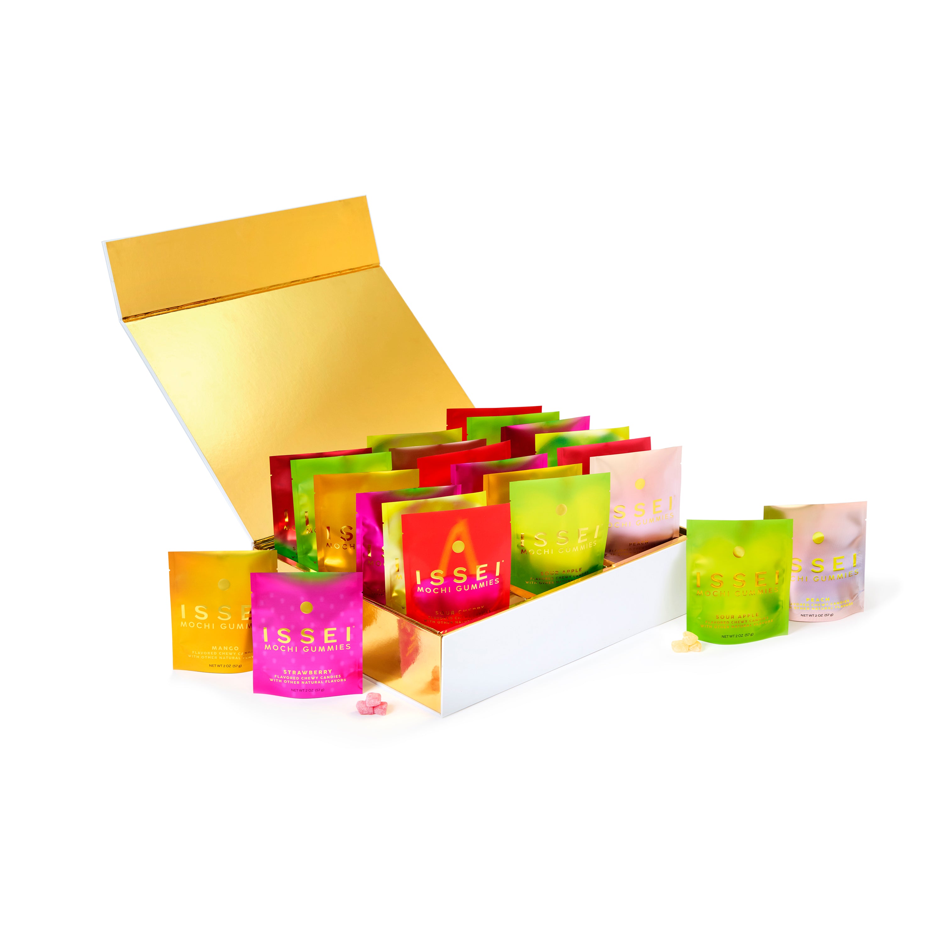 Assorted colorful Issei Mochi Gummies bags in a gold box on a white background