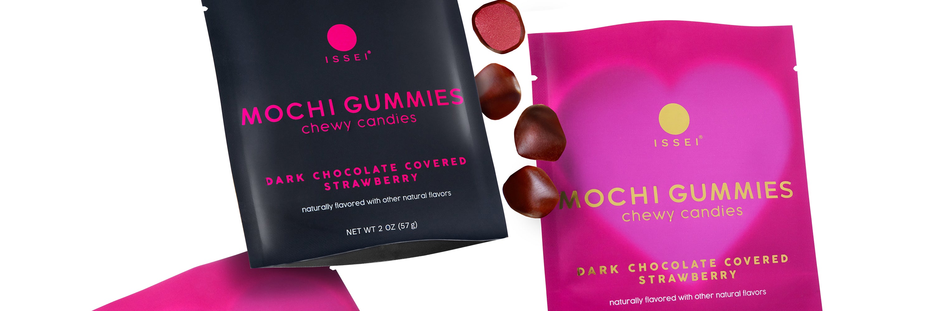 Packages of Issei Mochi Gummies featuring Dark Chocolate Covered Strawberry flavor. The packages are black with pink text and pink Valentine's themed.