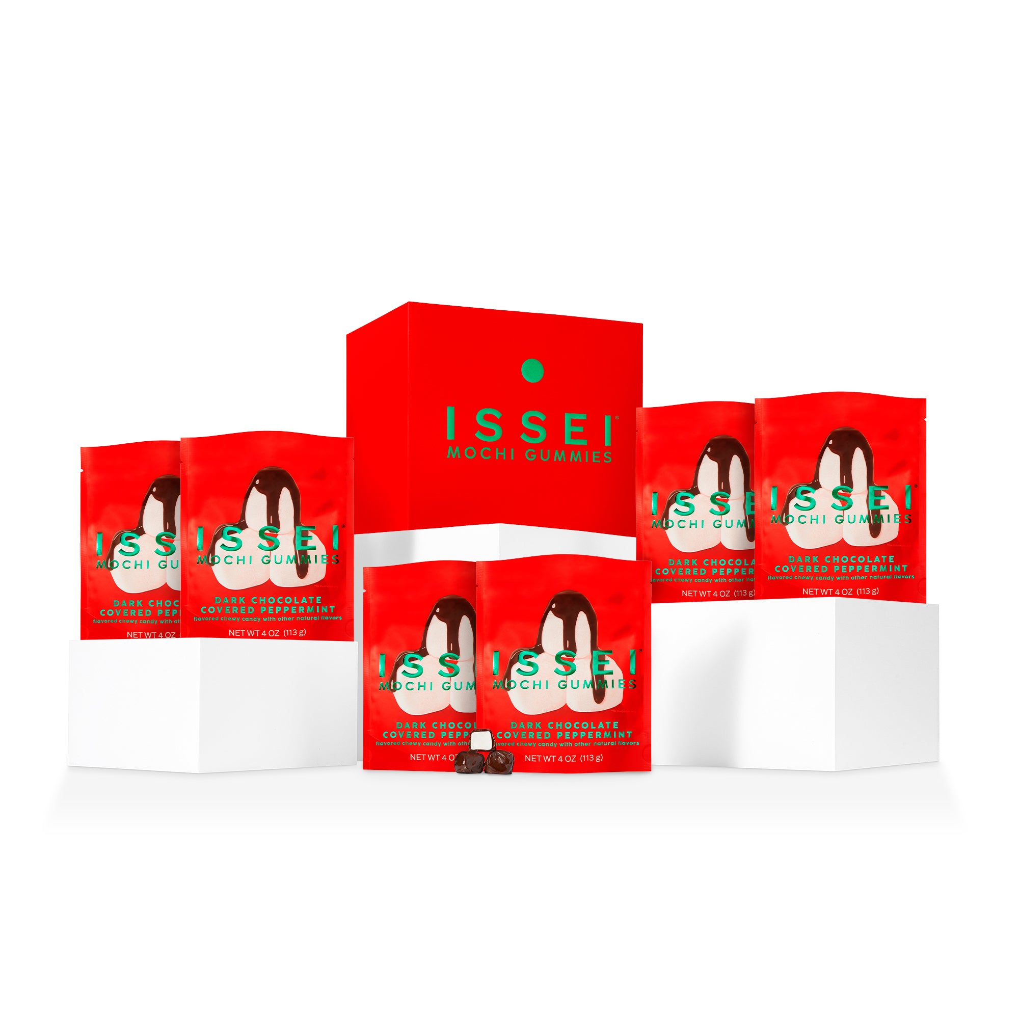 Red box displayed with Issei Mochi Gummies Dark Chocolate Covered Peppermint bags on a white background