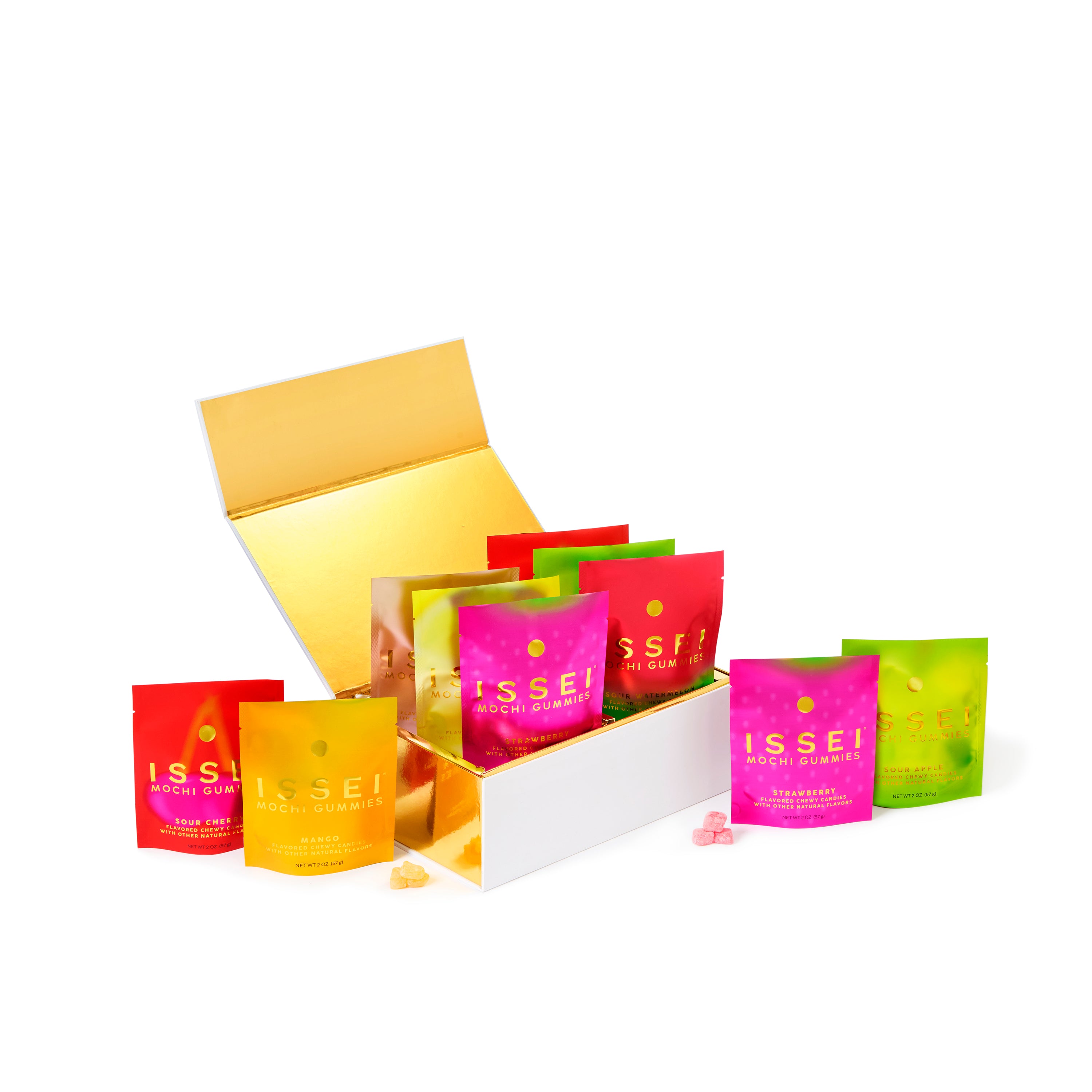 Assorted colorful Issei Mochi Gummies bags in a gold box on a white background