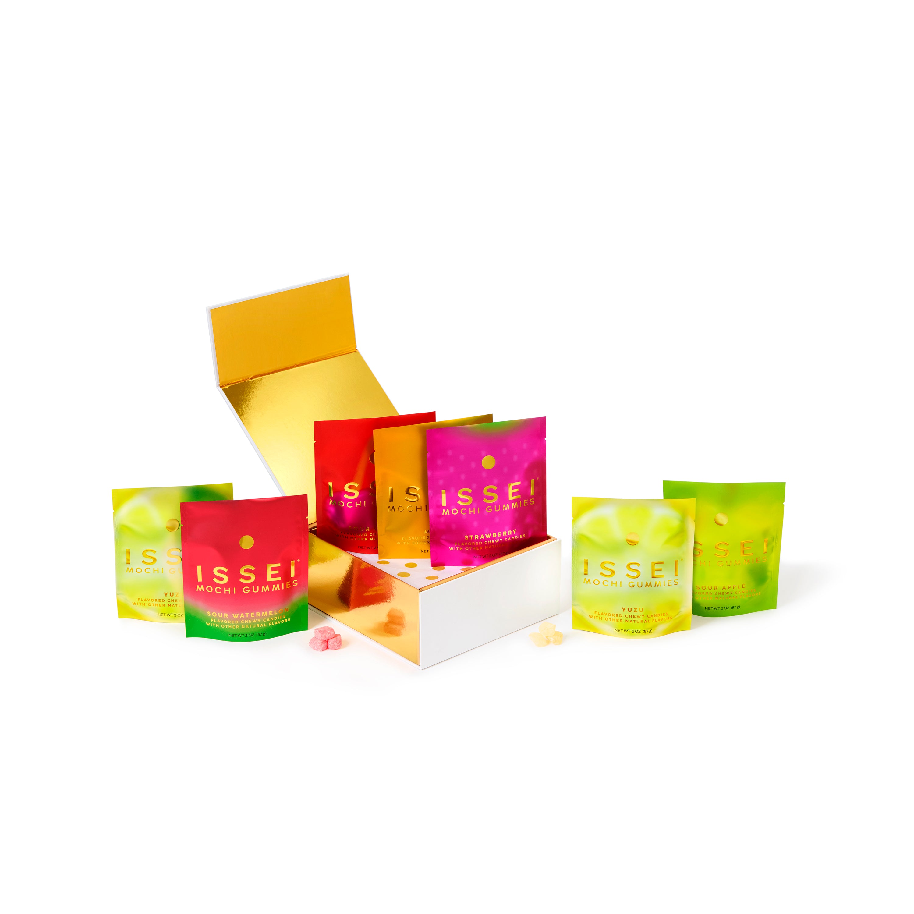 Assorted colorful Issei Mochi Gummies bags in a gold box on a white background